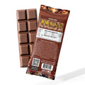 Chocolate bar with packaging featuring a dosing guide and QR code on a white background.